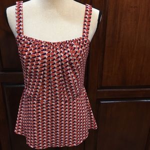 CAbi versatile sleeveless blouse. 100% polyester